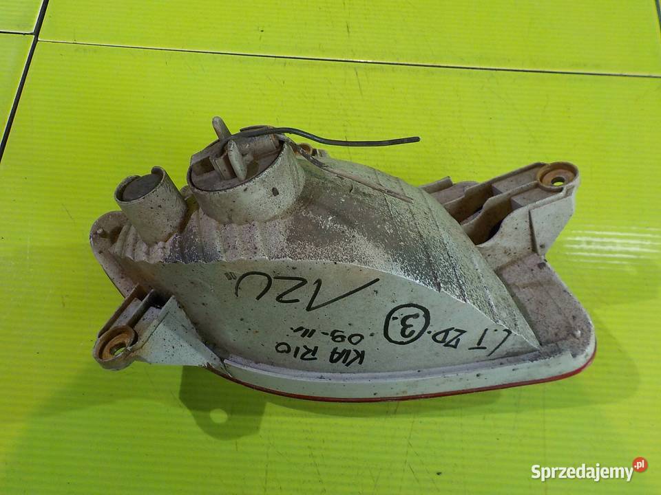 KIA RIO II LIFT 10r lampa lewa tyl w zderzak Suków