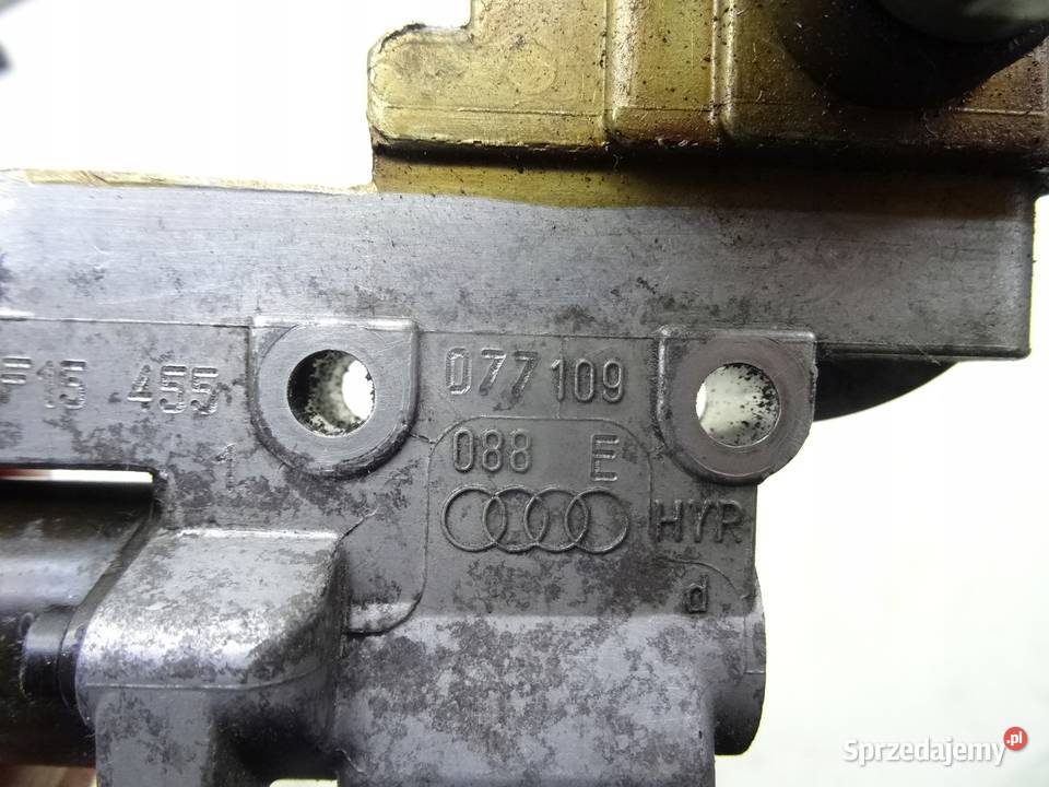 077109088E AUDI A8 D2 D3 NAPINACZ LANCUCHA WALKA Przemęt