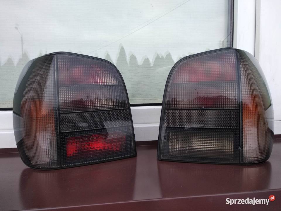 VW Polo III 6N lampy tył tylne Hella Black prawa osobowe