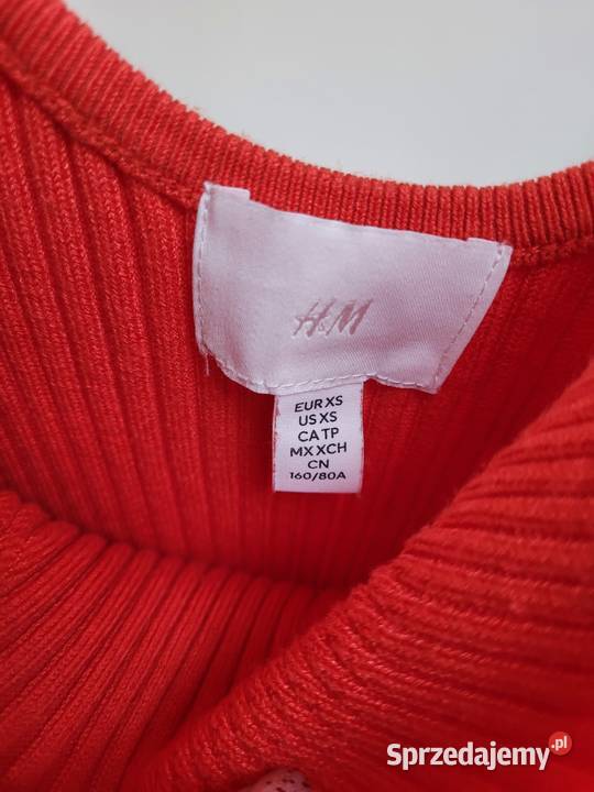 Pomarańczowa dzianinowa sukienka w prążki z Liszki