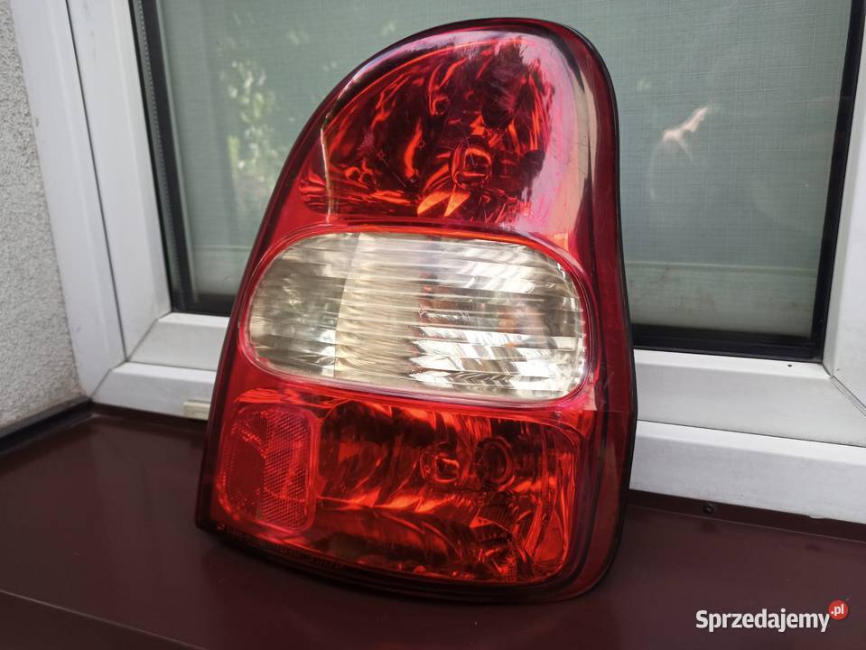 Kia Carnival I 1 lampa tył tylna prawa Oświetlenie Sieradz