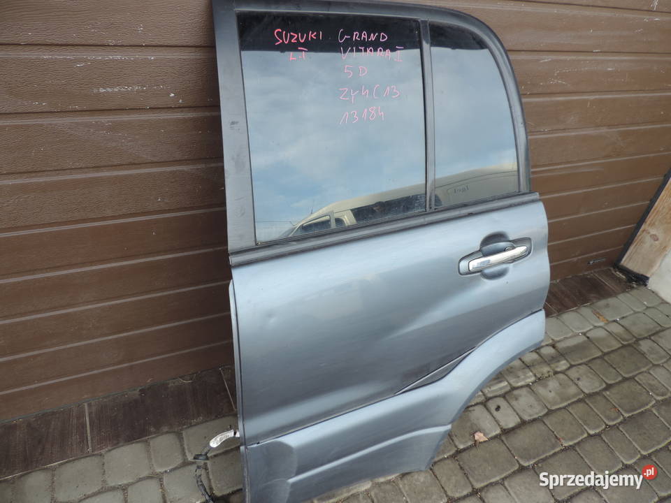 SUZUKI GRAND VITARA 1 5D DRZWI LEWY TYŁ ZY4C13 Rok produkcji 2004 małopolskie