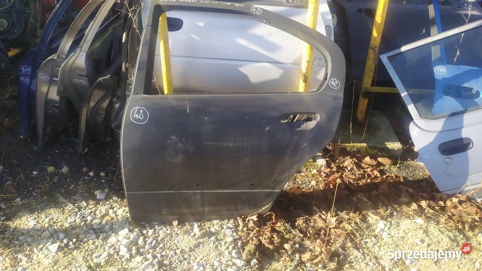 Nissan Primera P11 1997 98 2001 drzwi lewe tył Byków