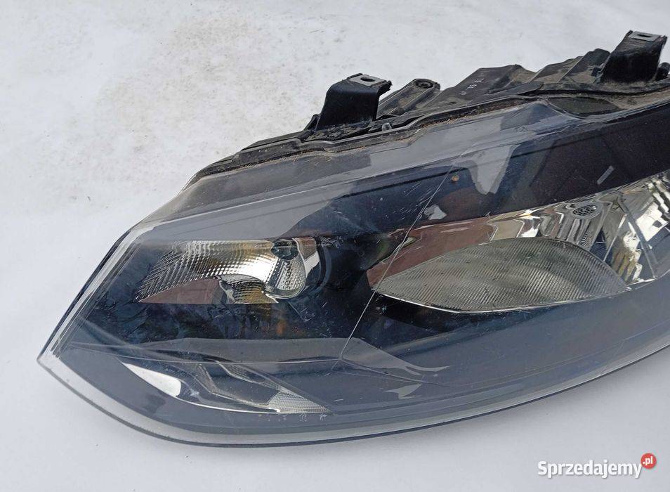 VW Polo 2R reflektor lampa lewy przód wielkopolskie Przeźmierowo sprzedam