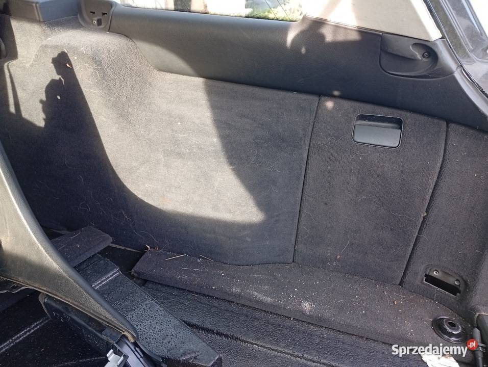 Boczki bagażnika stan Audi A6 C5 Avant czarne osobowe Kętrzyn