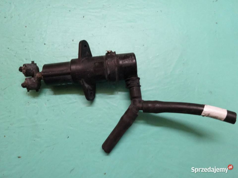 BMW X3 E83 04r spryskiwacz reflektorów lewy