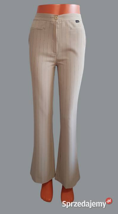 Damskie eleganckie beżowe spodnie materiałowe w Chrzanów