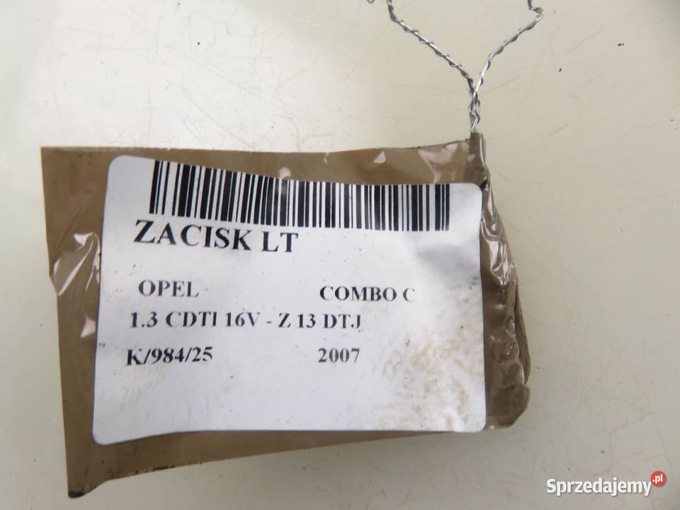 ZACISK LEWY TYŁ OPEL COMBO C 13 CDTI 16V Z 13