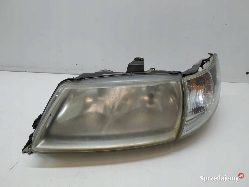 LAMPA PRZÓD LEWA EU 5142070 Saab 95 I 19972009 Lampy przednie
