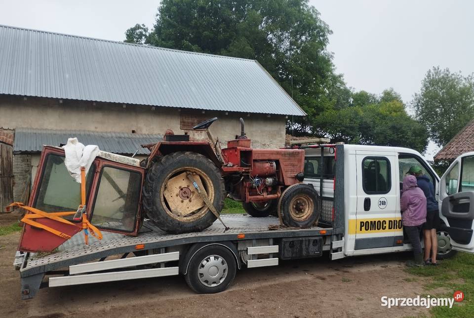 Pomoc drogowa holowanie transport laweta Giżycko usługi moto
