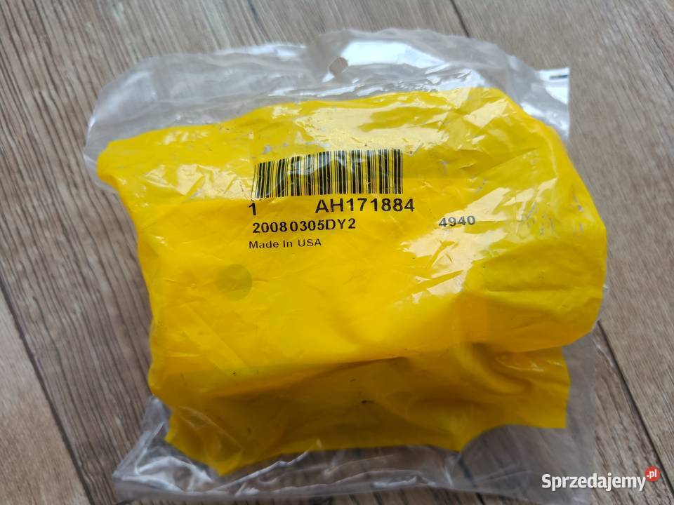 Wspornik palca nagarniacza John Deere oryginał