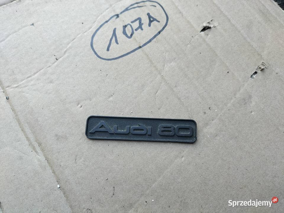 ZNACZEK EMBLEMAT NAPIS DESKI KONSOLI AUDI 80 B3 Kamień-Kolonia