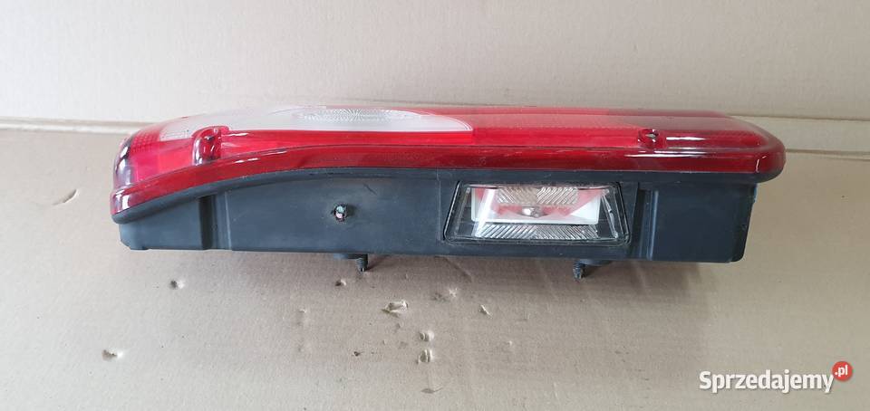 MAN SPRINTEL LAMPA TYŁ ORYGINAŁ LEWA Bieleń