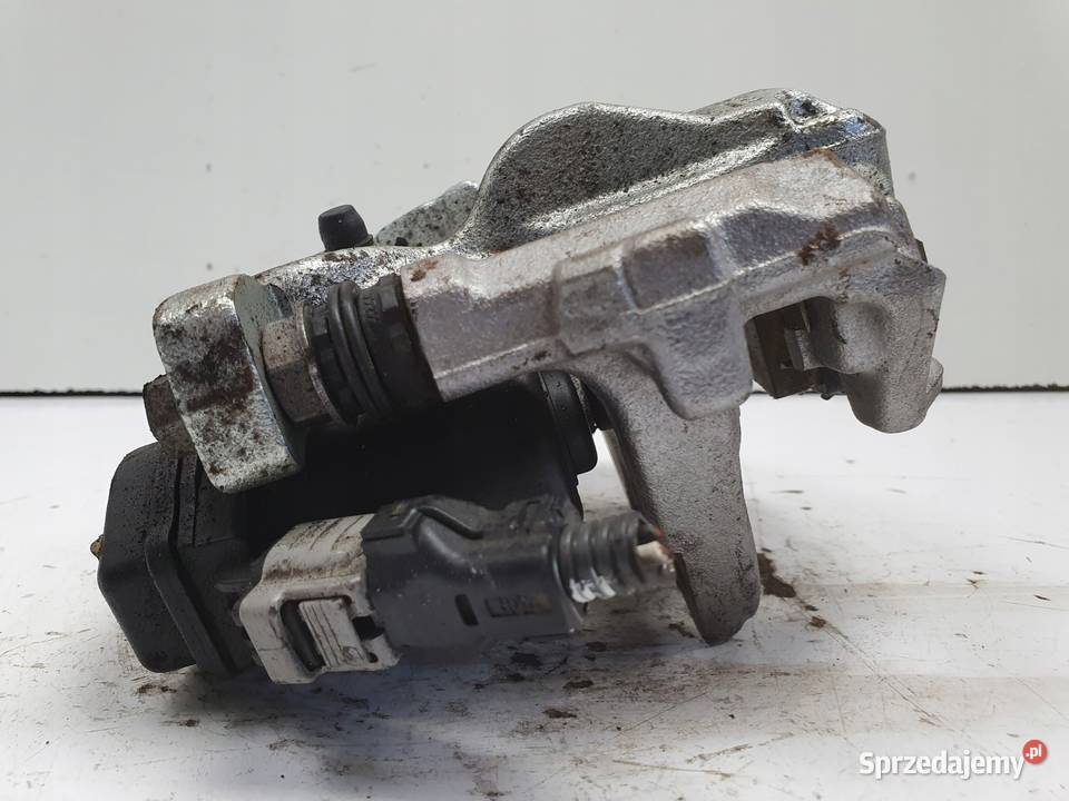 Toyota Corolla XII E21 TYLNY ZACISK HAMULCOWY osobowe