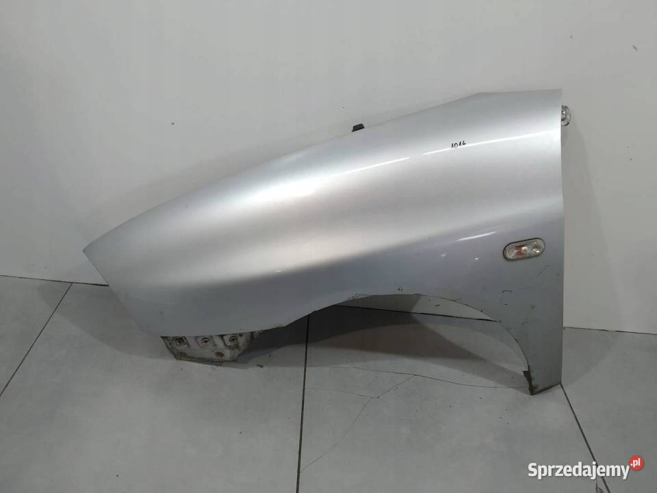 BŁOTNIK LEWY PRZÓD SREBRNY Seat Ibiza III