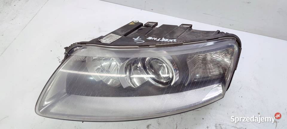 REFLEKTOR LEWY AUDI A6 C6 4F0941003BC SKRĘTNY UK Części samochodowe śląskie Przystajń