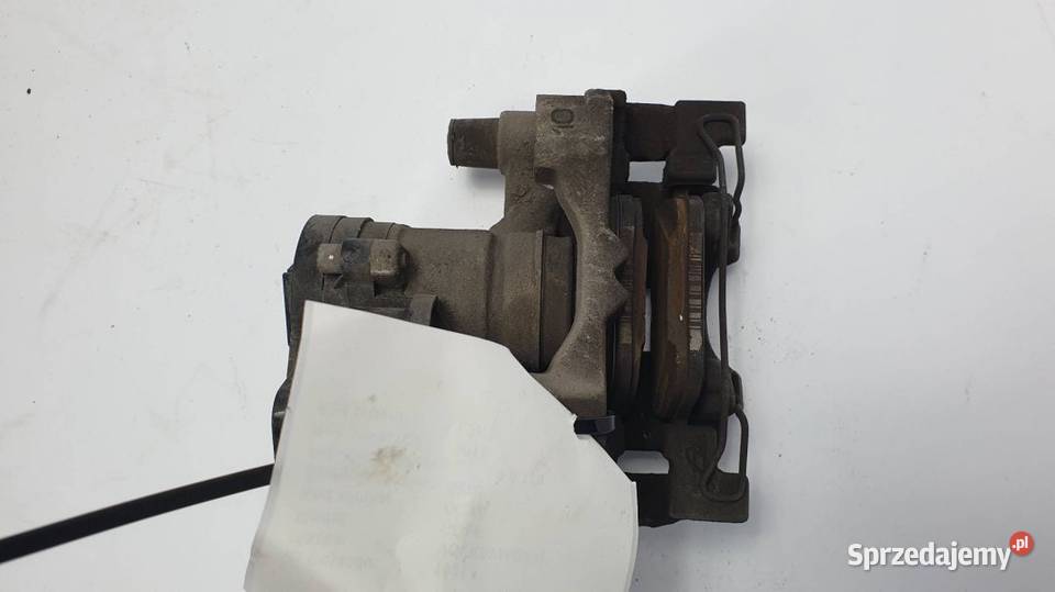 ZACISK HAMULCOWY TYŁ LEWY 5Q0615405EE GOLF VII Lipno