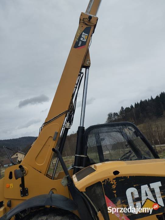 ładowarka teleskopowa cat th 407 Sucha Beskidzka