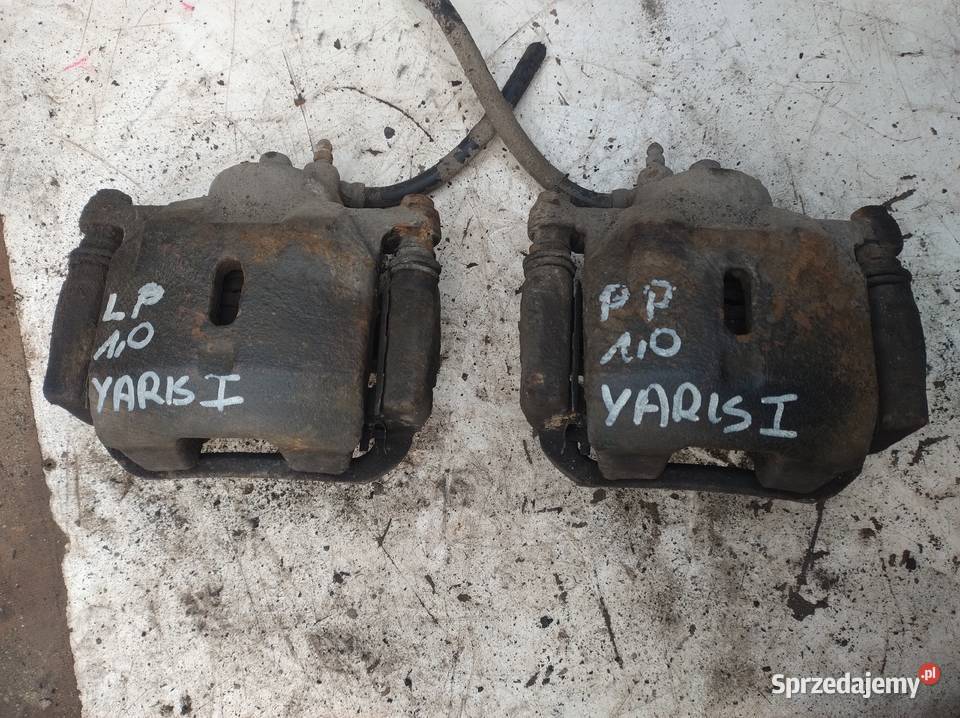 TOYOTA YARIS I 10 zacisk jarzmo przód prawe lewe Zaciski i jarzma