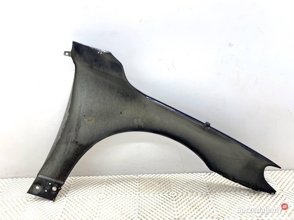 BŁOTNIK LEWY PRZÓD VOLVO V70 III Kombi 0716 osobowe