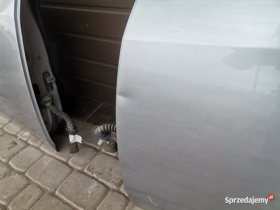 NISSAN PRIMERA P12 HB DRZWI LEWY TYŁ KY0G Nowy Sącz