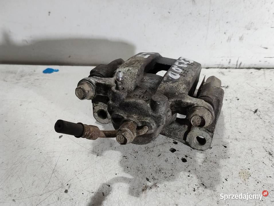 ZACISK HAMULCOWY LEWY TYŁ INFINITI EX 30 D