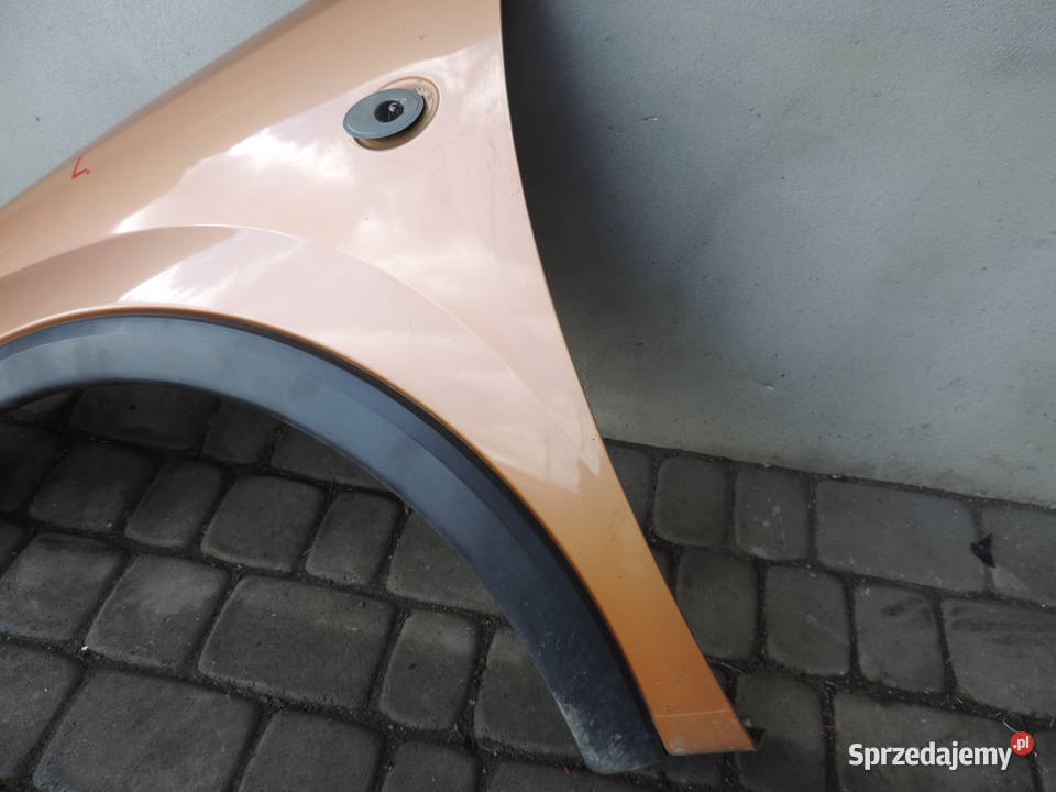 OPEL CORSA C BŁOTNIK LEWY PRZÓD Z40E Rok produkcji 2004 Nowy Sącz