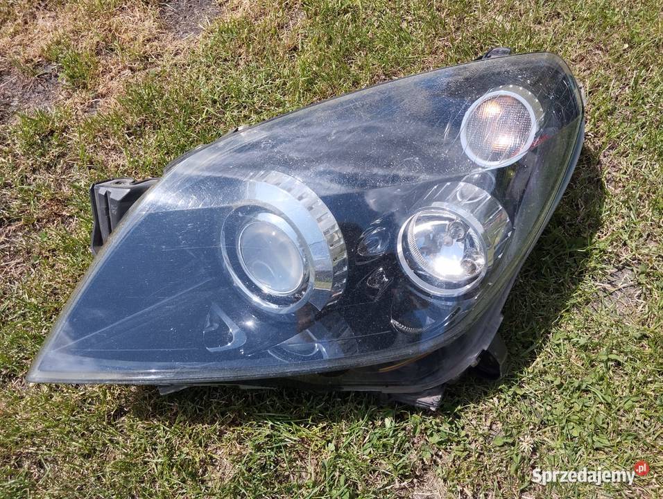 Lampa Opel Astra H III lewy przód BiXenon osobowe Kamieniec