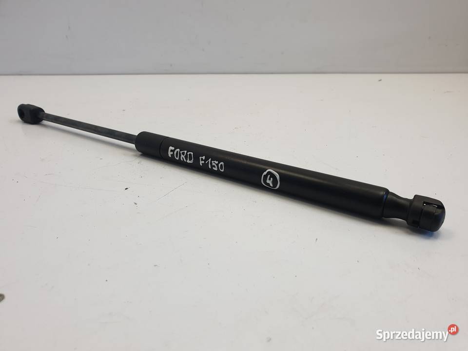 Ford F150 1520r SIŁOWNIK PRZEDNIEJ MASKI