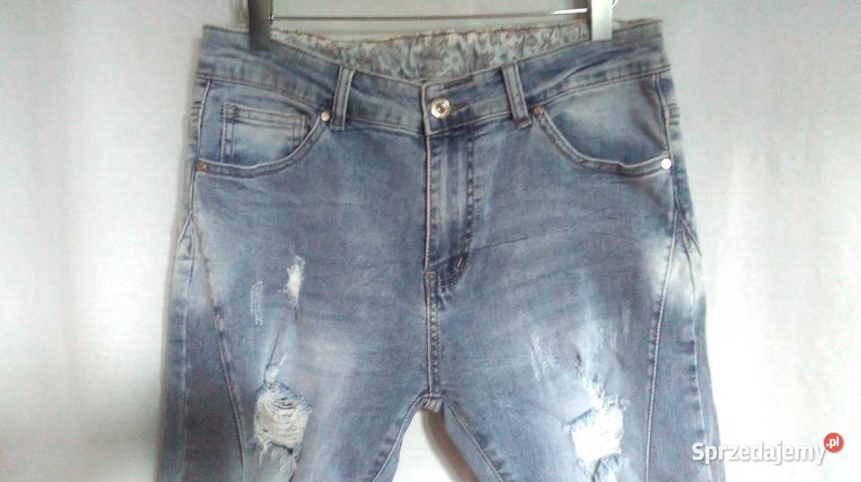 Spodnie damskie JEANS jasny r L Przetarcia gat I
