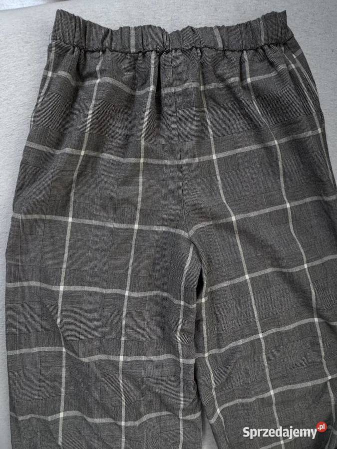 Szerokie eleganckie spodnie Spodnie Rumia