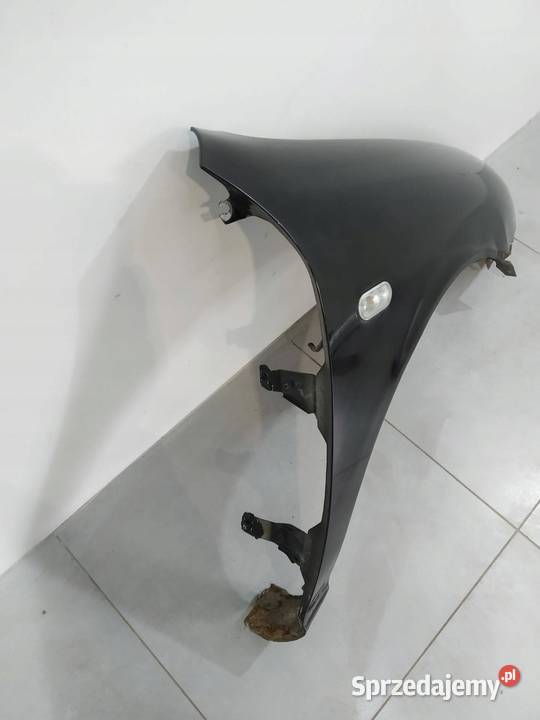 BŁOTNIK PRAWY PRZÓD CZARNY LEON I Seat Toledo II osobowe