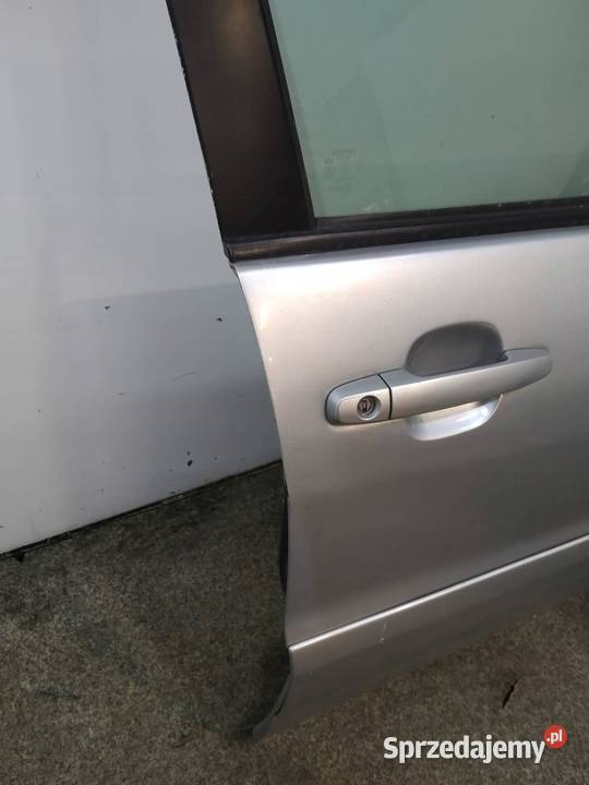 DRZWI PRAWE PRZÓD SREBRNE 1D4 Toyota RAV4 II Części samochodowe