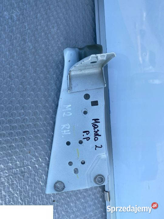 MAZDA 2 14 MOCOWANIE WSPORNIK BŁOTNIKA PRAWY Karoseria Kozubszczyzna
