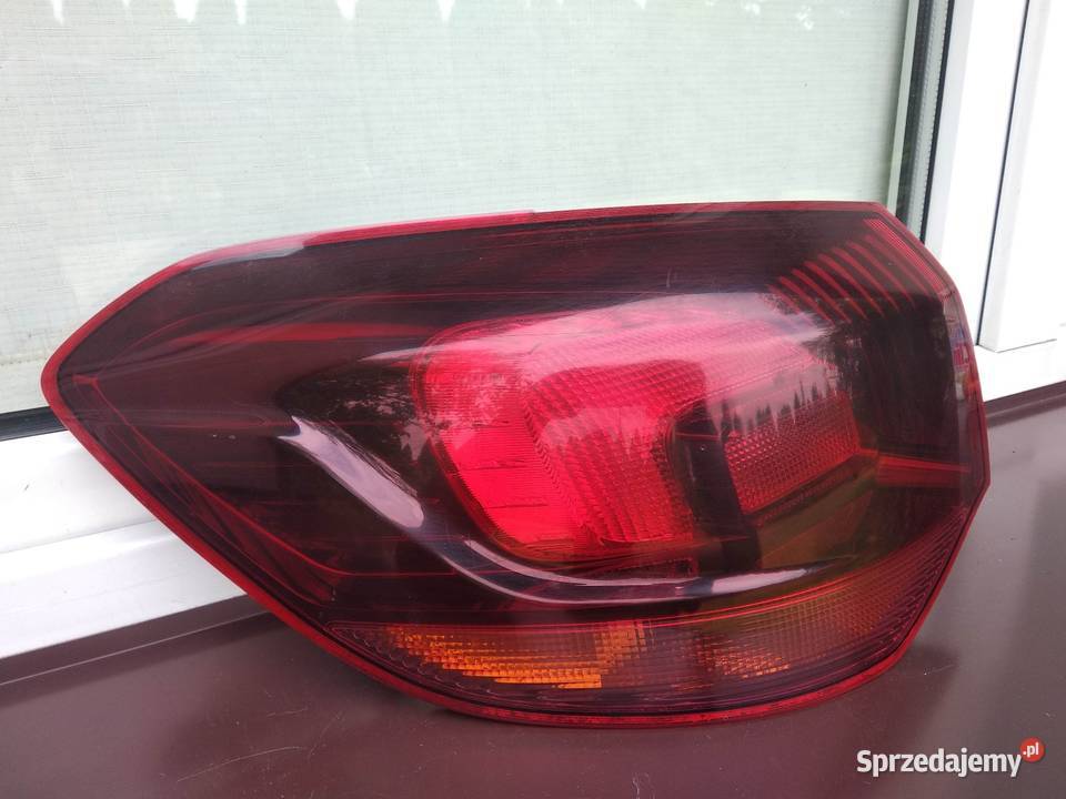 Opel Astra J kombi lampa tył tylna lewa narożna Części samochodowe Sieradz
