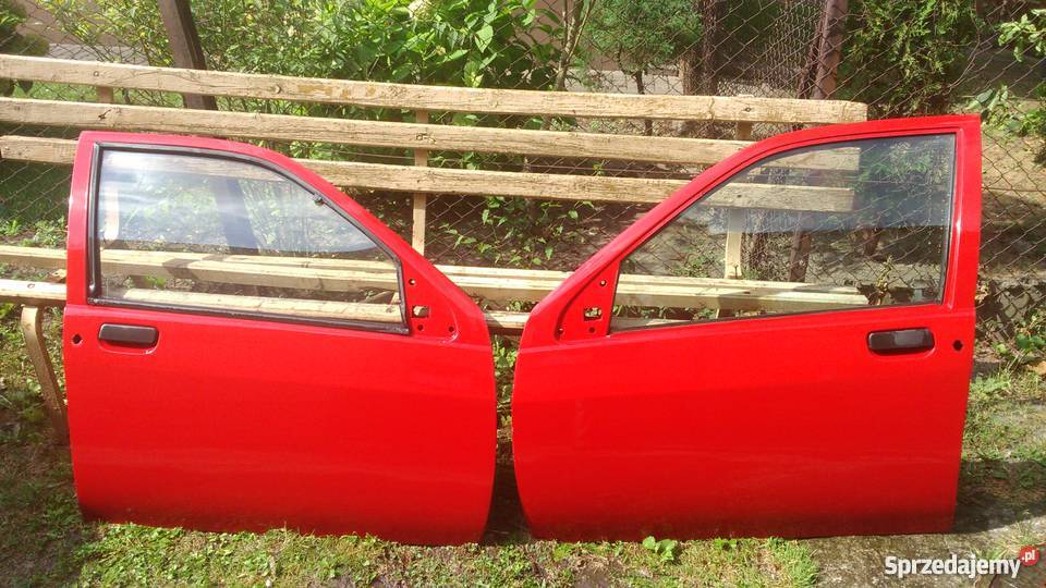 Drzwi lewe i prawe z szybami świeży lakier do części blacharskie Jarosław