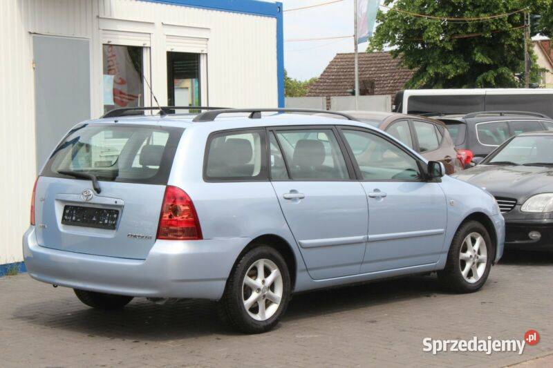 COROLLA E12 drzwi prawy przód czerwoną bez sprzedam