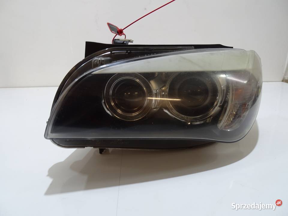LAMPA LEWA PRZEDNIA XENON BMW X1 E84 OE 2990009 Lampy przednie Strzyżewice