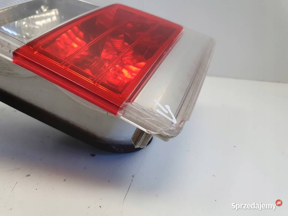 LAMPA TYLNIA LEWA Volvo V70 III 1416r LIFT LEWY Rudka