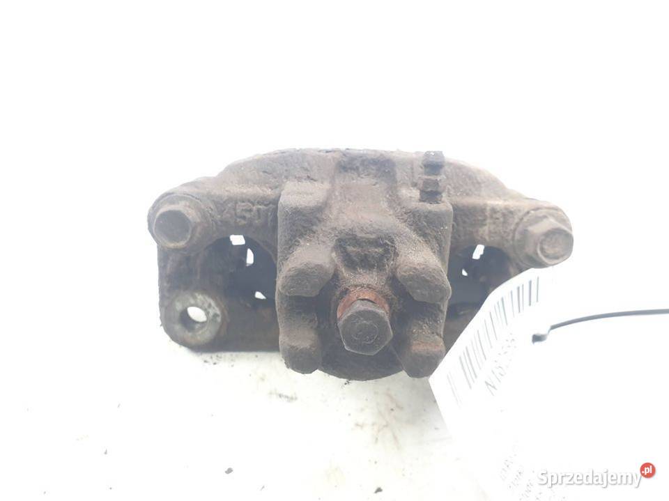 ZACISK HAMULCOWY TYŁ LEWY MITSUBISHI PAJERO 4 Pozostałe Części samochodowe Lipno