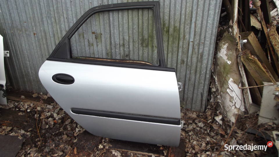 Renault Laguna 1 drzwi prawy tył osobowe Poznań