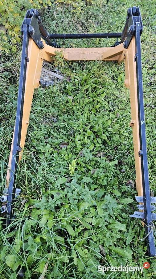 Ramię ładowacza czołowego samopoziomujacego do małopolskie
