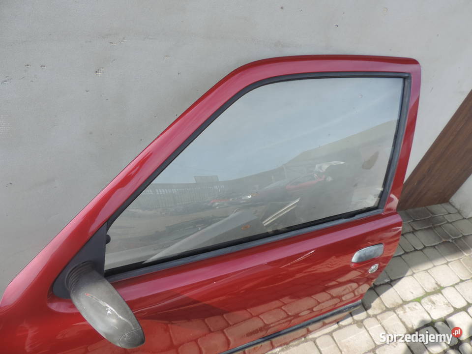 FIAT SEICENTO DRZWI LEWE PRZEDNIE KOLOR 124B osobowe Części samochodowe
