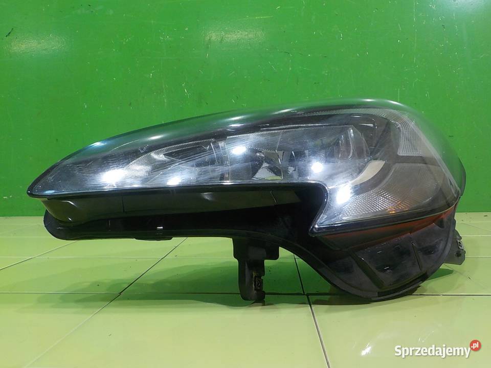 OPEL CORSA E 14 B 15r 1419 lampa lewa przod Suków
