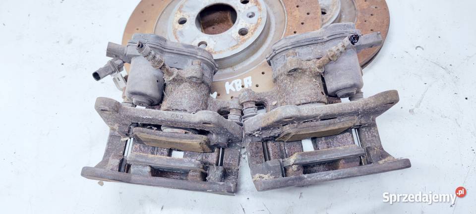 ZACISK HAMULCOWY TYŁ KOMPLET AUDI A6 C7 A7 330 Przystajń
