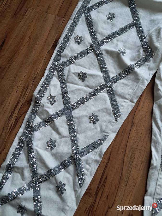 nowe białe spodnie z cekinami rozmiar L 74 Sandomierz