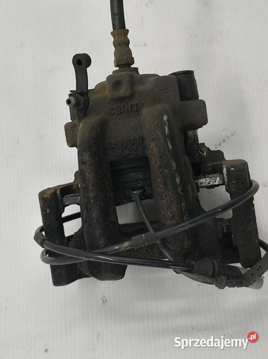 ZACISK PRAWY TYŁ BMW F31 20D LIFT Części samochodowe