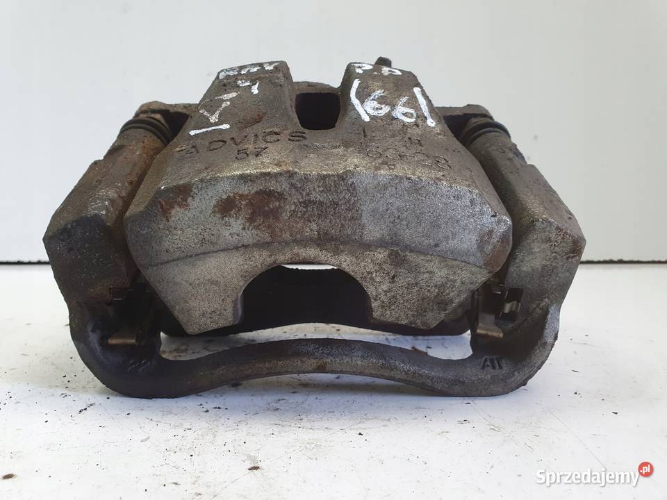 Toyota RAV4 IV V PRZEDNI ZACISK HAMULCOWY lewy