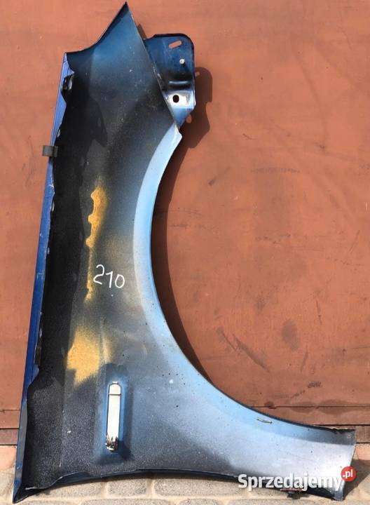 Błotnik Przód Przedni Lewy Opel Tigra B kod Skołoszów