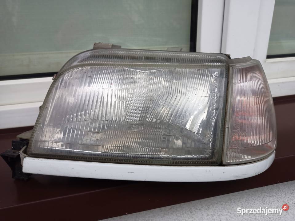 Renault Clio I 1 lampa przednia lewe reflektor lampy przednie Oświetlenie łódzkie sprzedam